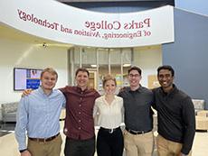 Kelly Kulig, Connor McCormac, Michael Nickerson, Carl Pickhardt, Aneesh Reddlapalli posed inside McDonnell Douglas Hall