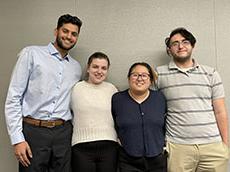 Brady Beggs, Cecilia Besancenez, Yichen Fang, Nachi Rotte  standing in front of a white wall 